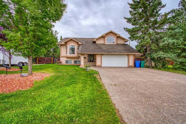 115 11a Street, House detached with 4 bedrooms, 2 bathrooms and 4 parking in Beaverlodge AB | Image 1