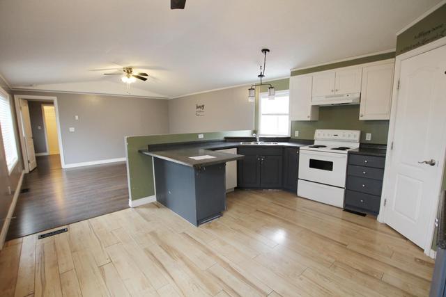 239 Belgian Green, House detached with 4 bedrooms, 2 bathrooms and 4 parking in Wood Buffalo AB | Image 1