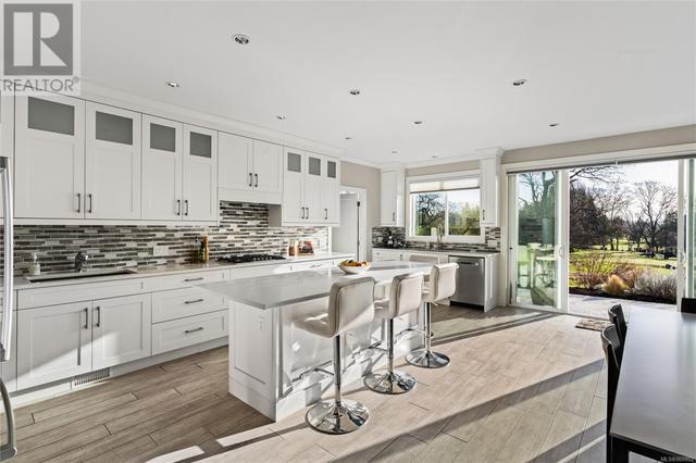 Kitchen with sliding glass doors open | Image 7