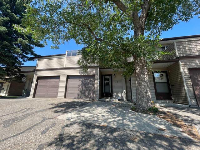 22 - 4025 Glacier Avenue S, Home with 3 bedrooms, 2 bathrooms and 2 parking in Lethbridge AB | Image 2