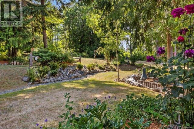 6249 Island Hwy, House detached with 3 bedrooms, 3 bathrooms and 8 parking in Comox Valley A BC | Image 56