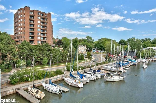 1004 - 100 Lakeshore Road E, House attached with 1 bedrooms, 2 bathrooms and 1 parking in Oakville ON | Image 1