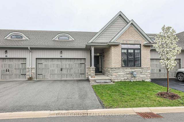 18 Borden Tr, Townhouse with 2 bedrooms, 3 bathrooms and 4 parking in Welland ON | Image 1