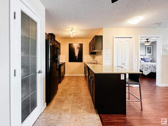 413 - 12650 142 Av Nw, Condo with 2 bedrooms, 2 bathrooms and null parking in Edmonton AB | Image 2