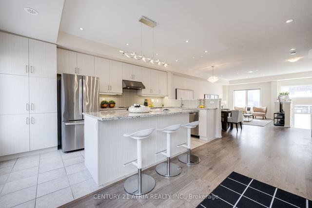 28 Coneflower Cres, House attached with 4 bedrooms, 4 bathrooms and 2 parking in Toronto ON | Image 3