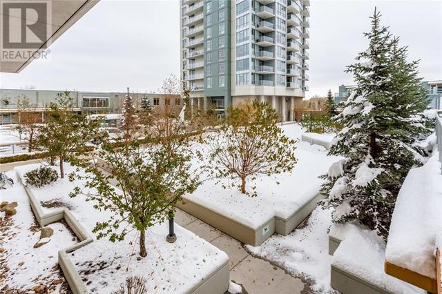 132, - 99 Spruce Place Sw, House attached with 2 bedrooms, 2 bathrooms and 2 parking in Calgary AB | Image 27