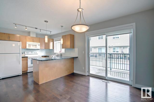 38 - 675 Albany Wy Nw, House attached with 3 bedrooms, 2 bathrooms and 2 parking in Edmonton AB | Image 12