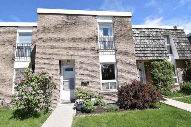 41 - 713 Burnhamthorpe Rd, Townhouse with 3 bedrooms, 2 bathrooms and 1 parking in Toronto ON | Image 1