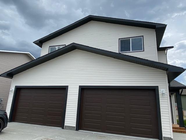 10618 114b Street, Home with 3 bedrooms, 2 bathrooms and 4 parking in Grande Prairie AB | Image 2