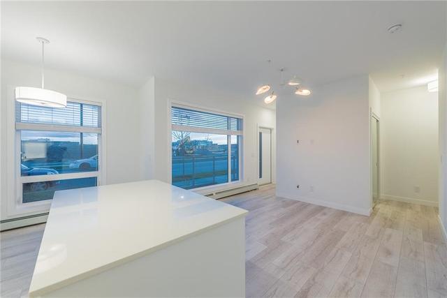 108 - 3125 39 Street Nw, Home with 2 bedrooms, 2 bathrooms and 1 parking in Calgary AB | Image 13