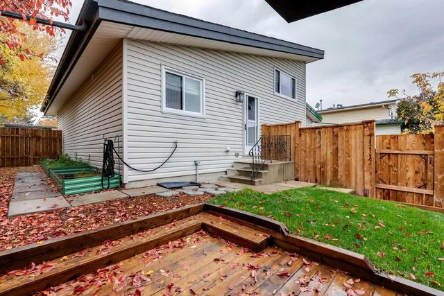 802 Canfield Way Sw, Home with 2 bedrooms, 2 bathrooms and 3 parking in Calgary AB | Image 16