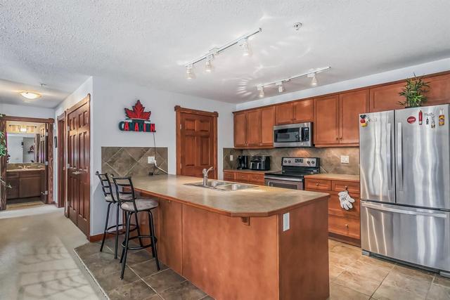 205 - 150 Crossbow Place, Condo with 3 bedrooms, 2 bathrooms and 1 parking in Kananaskis AB | Image 7