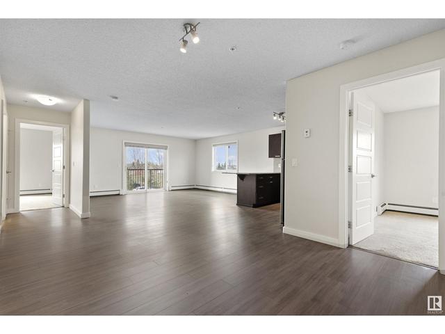 203 - 14808 125 St Nw, Condo with 2 bedrooms, 2 bathrooms and null parking in Edmonton AB | Card Image
