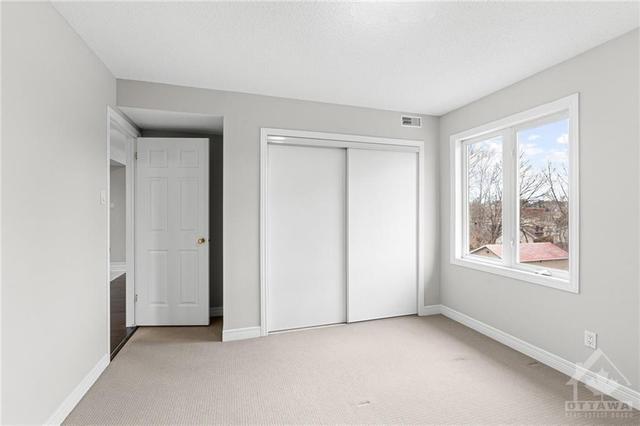 Photos are of another unit with same floor plan but mirror image. | Image 18