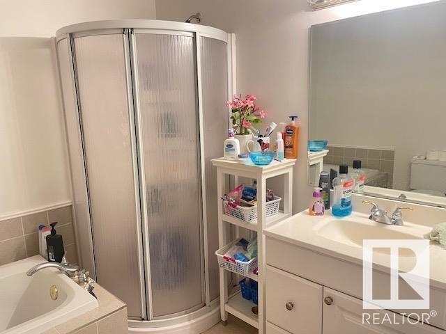 102 - 16725 106 St Nw, House attached with 2 bedrooms, 1 bathrooms and 2 parking in Edmonton AB | Image 11