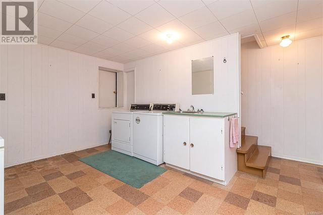 Laundry room downstairs | Image 22