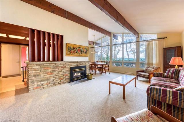 Open living room and dining room with Lake Huron views. Ideal for entertaining | Image 10