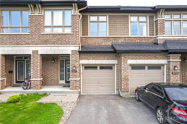 317 Livery Street, Townhouse with 3 bedrooms, 3 bathrooms and 3 parking in Ottawa ON | Image 2