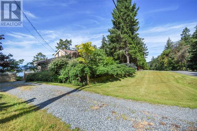 2565 Islands View Dr, House detached with 5 bedrooms, 3 bathrooms and 6 parking in Nanaimo B BC | Image 54