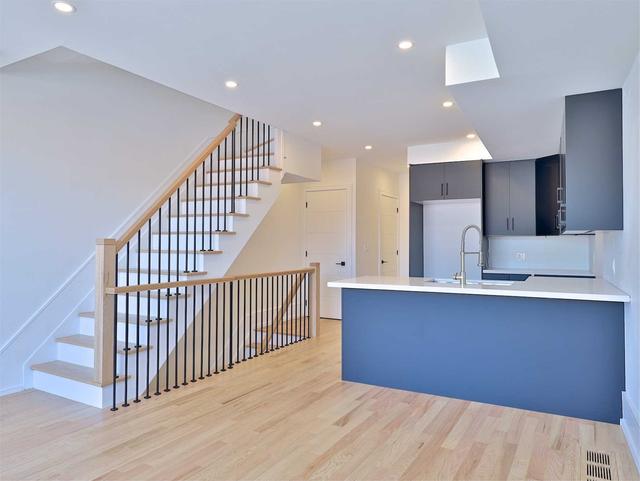 143 D' Arcy St, House attached with 2 bedrooms, 2 bathrooms and 2 parking in Toronto ON | Image 2