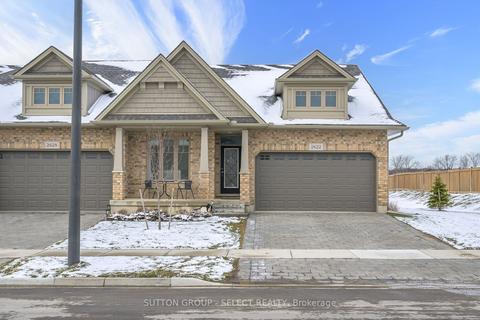 2622 Buroak Dr, Townhouse with 2 bedrooms, 3 bathrooms and 4 parking in London ON | Card Image