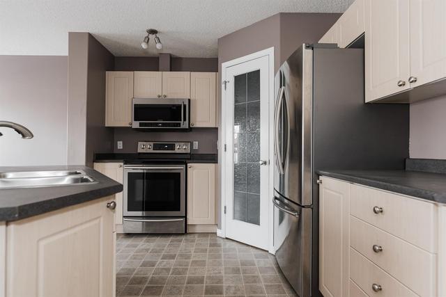 287 Bear Paw Drive, Home with 4 bedrooms, 2 bathrooms and 3 parking in Wood Buffalo AB | Image 6