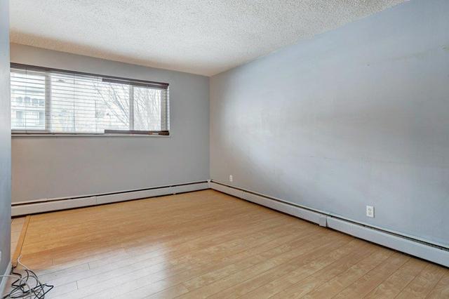 12 - 1703 11 Avenue Sw, Condo with 1 bedrooms, 1 bathrooms and 1 parking in Calgary AB | Image 2