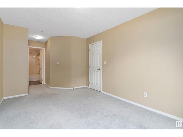 118 - 9730 174 St Nw, Condo with 2 bedrooms, 2 bathrooms and 1 parking in Edmonton AB | Image 31