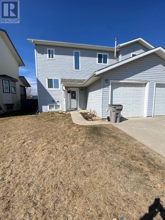 8306 114a St, House semidetached with 4 bedrooms, 2 bathrooms and 2 parking in Grande Prairie AB | Card Image