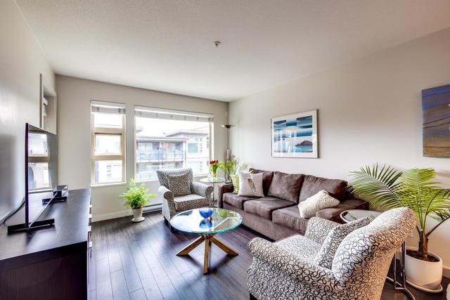 411 - 1679 Lloyd Avenue, Condo with 1 bedrooms, 1 bathrooms and null parking in North Vancouver BC | Card Image