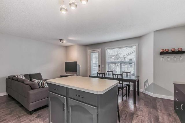 214 Mt Douglas Manor Se, Home with 3 bedrooms, 1 bathrooms and 2 parking in Calgary AB | Image 5