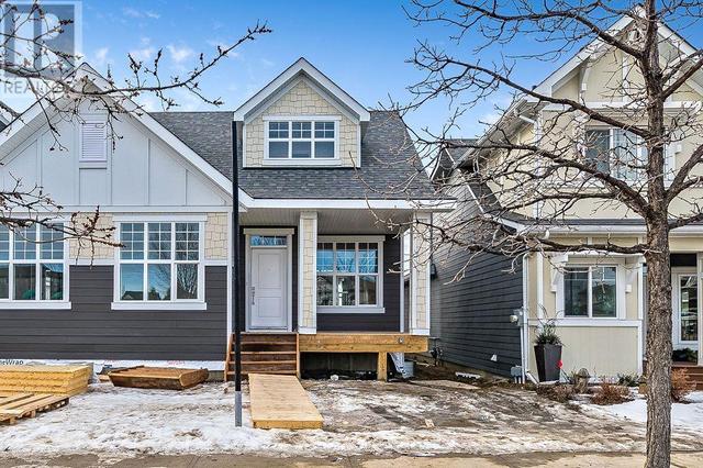 11 Drake Landing Square, House semidetached with 4 bedrooms, 3 bathrooms and 2 parking in Okotoks AB | Image 1