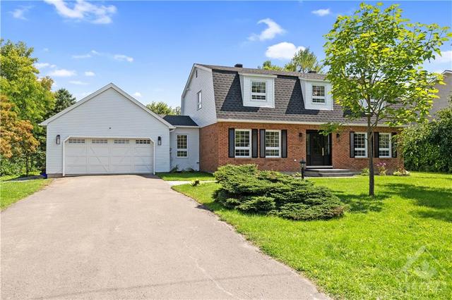 Welcome to 5545 Van Vliet Road. This 4 bedroom, 3 bathroom home has been extensively updated inside and out. | Image 1