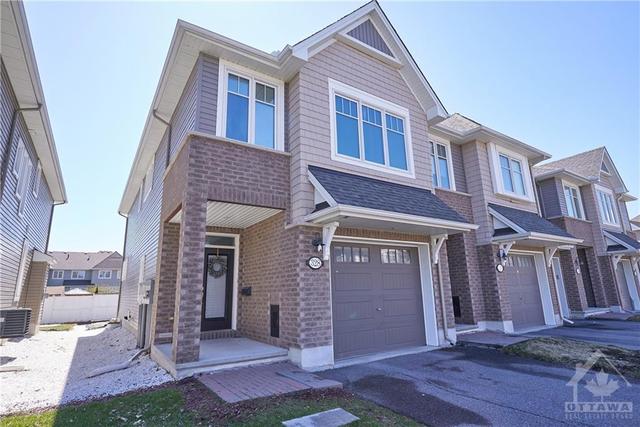 328 Alasken Drive, Townhouse with 4 bedrooms, 3 bathrooms and 3 parking in Ottawa ON | Image 1