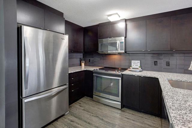 101 - 15 Aspenmont Heights Sw, Condo with 2 bedrooms, 2 bathrooms and 1 parking in Calgary AB | Image 15