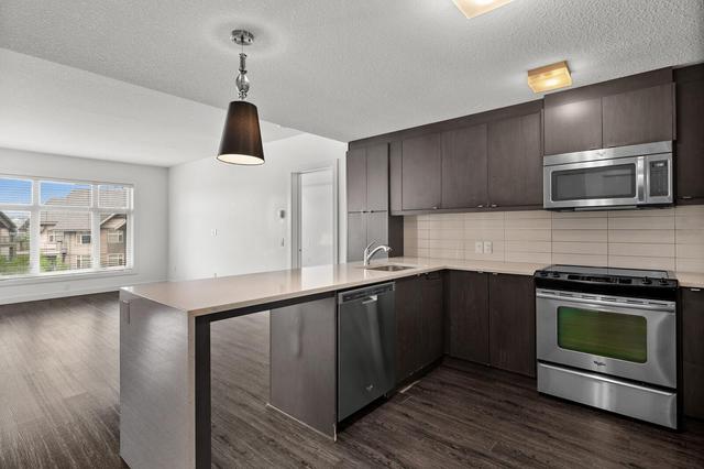 318 - 25 Aspenmont Heights Sw, Condo with 3 bedrooms, 2 bathrooms and 2 parking in Calgary AB | Image 5