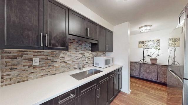 310 - 270 Palmdale Dr, Condo with 2 bedrooms, 1 bathrooms and 1 parking in Toronto ON | Image 6