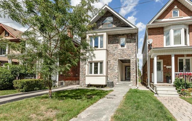 18 Dennis Ave, House detached with 5 bedrooms, 3 bathrooms and 3 parking in Toronto ON | Image 1
