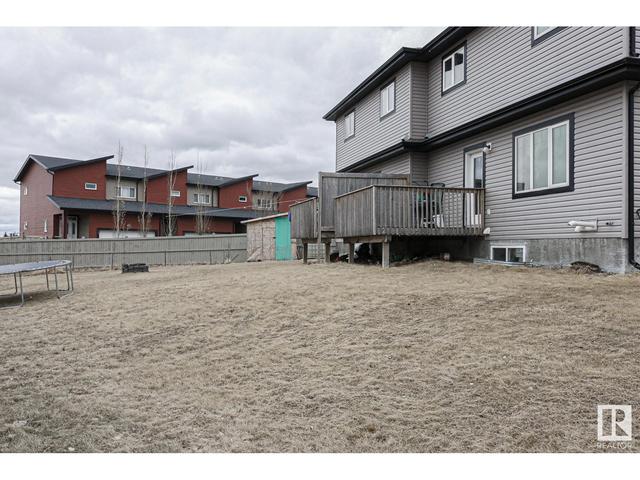 13028 166 Av Nw Nw, House semidetached with 4 bedrooms, 3 bathrooms and null parking in Edmonton AB | Image 51