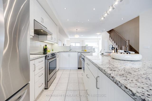 28 Coneflower Cres, House attached with 4 bedrooms, 4 bathrooms and 2 parking in Toronto ON | Image 5