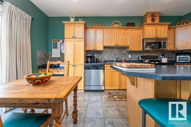 93 - 13825 155 Av Nw, House attached with 2 bedrooms, 1 bathrooms and 2 parking in Edmonton AB | Image 13