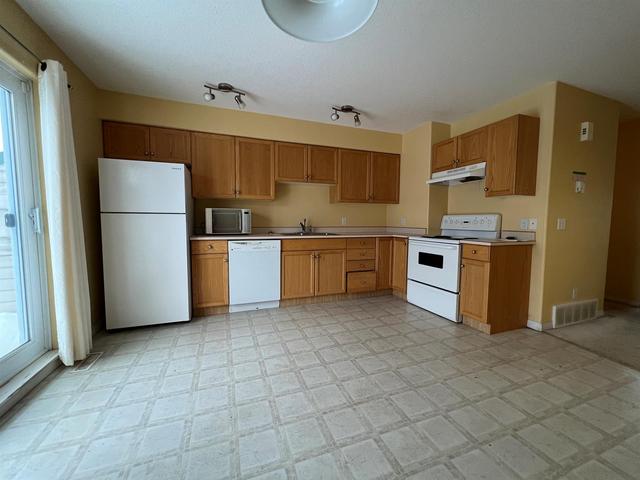 302 - 123 Arabian Drive, Home with 2 bedrooms, 1 bathrooms and 2 parking in Wood Buffalo AB | Image 9