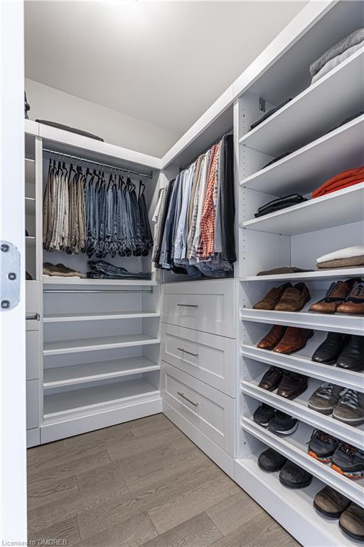 Custom finished walk in closet in primary suite | Image 24