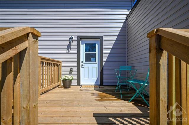Perfect place to enjoy your morning coffee, lovely side deck just off kitchen and dining. | Image 27