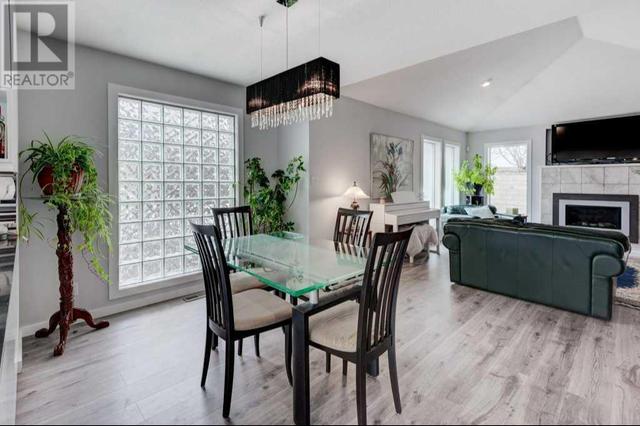 Plenty of room for a large dining table for your get-togethers. Vinyl plank floors throughout main and upper floor | Image 9