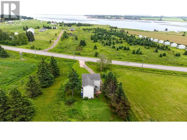 6825 Rustico Road, House detached with 2 bedrooms, 2 bathrooms and null parking in North Rustico FD PE | Image 2