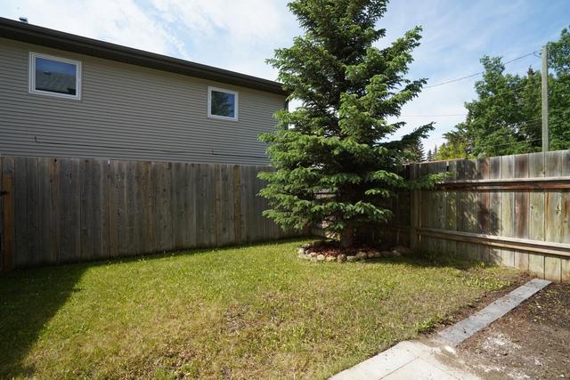 1 - 4406 46 Avenue, Home with 3 bedrooms, 1 bathrooms and 2 parking in Red Deer County AB | Image 10
