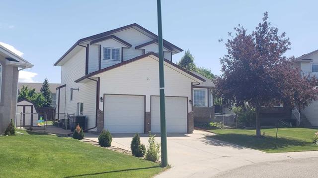 52 Storrs Crescent Se, House detached with 4 bedrooms, 3 bathrooms and 2 parking in Medicine Hat AB | Image 2