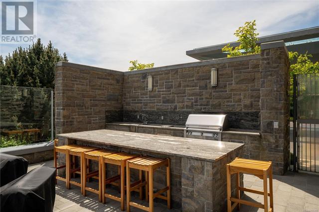 Outdoor kitchen and sitting area | Image 35