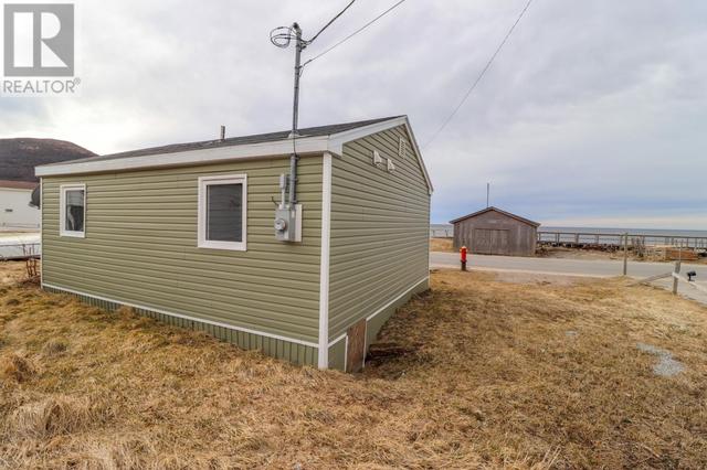 272 Main Street, House detached with 2 bedrooms, 1 bathrooms and null parking in Trout River NL | Image 3